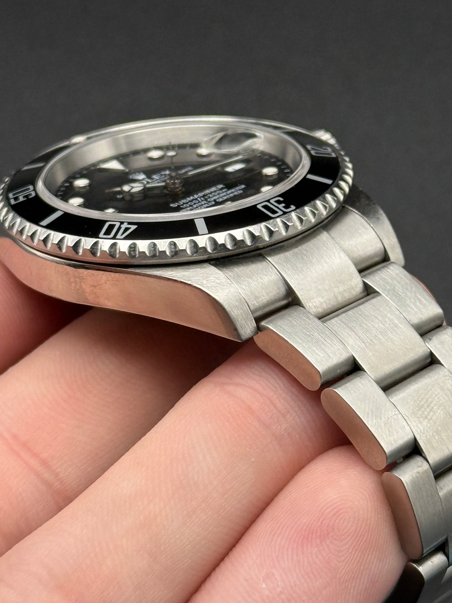 Rolex Submariner Date 16610T D Serial Watch and Hang Tag