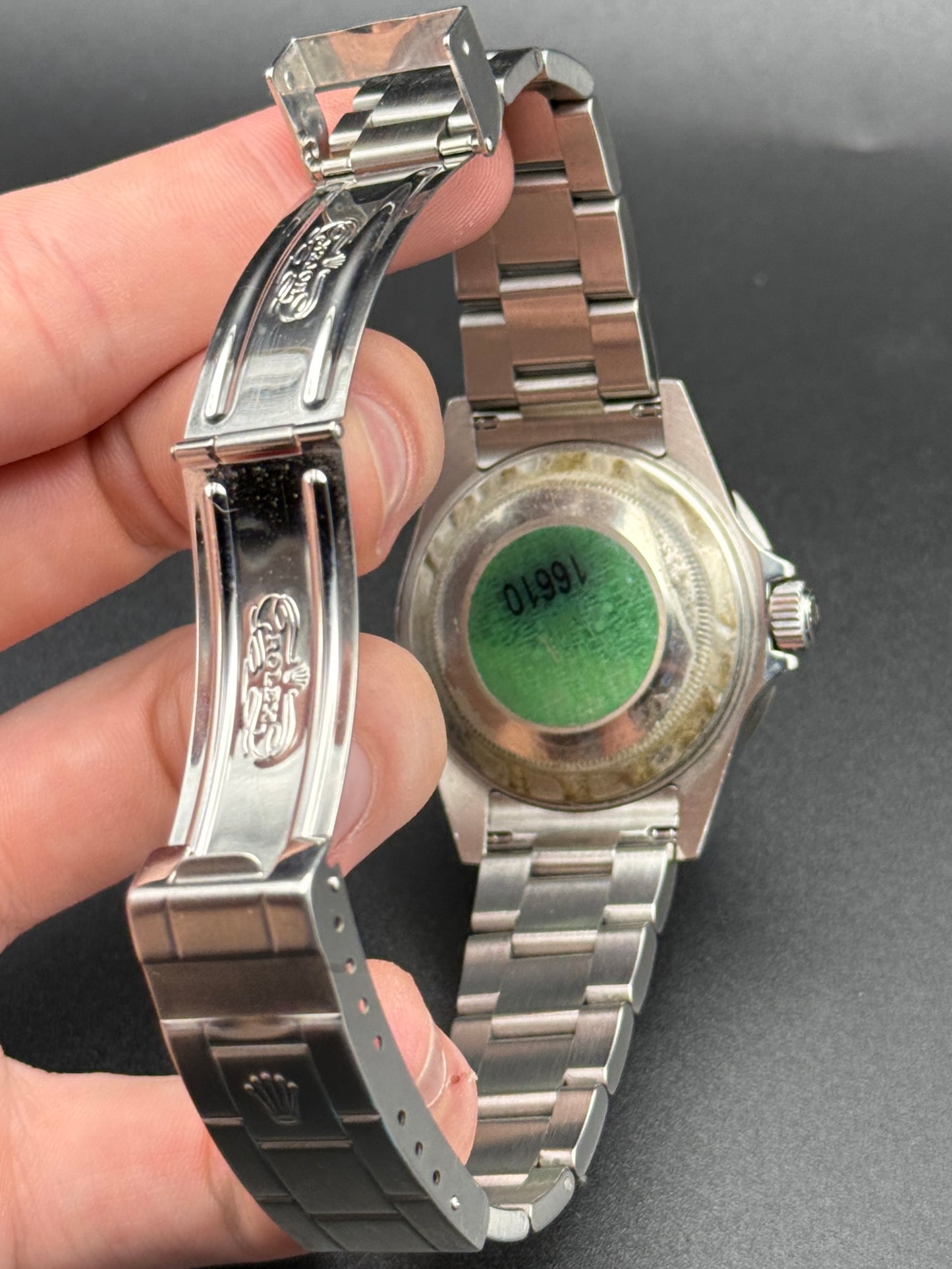 Rolex Submariner Date 16610T D Serial Watch and Hang Tag