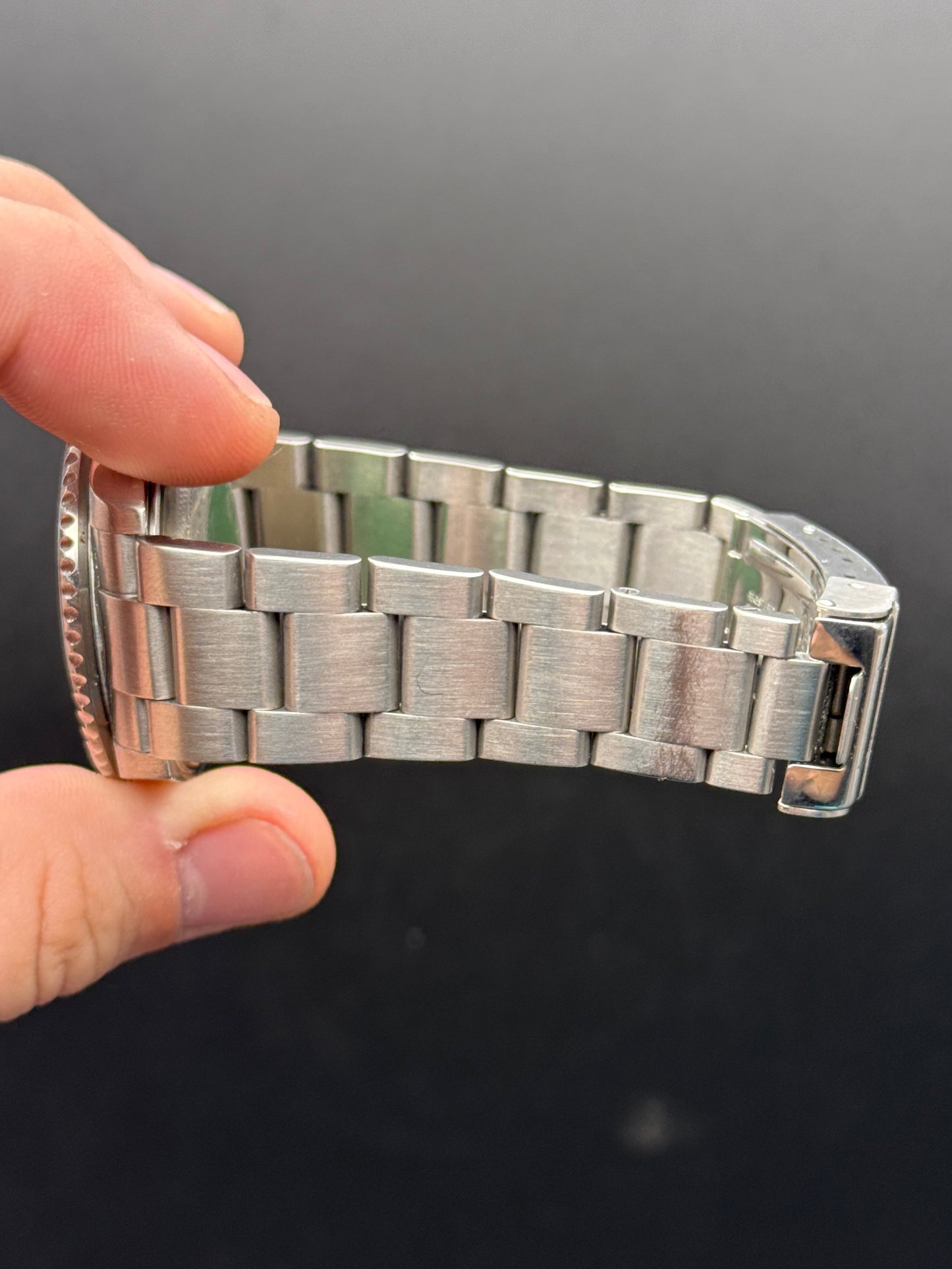 Rolex Submariner Date 16610T D Serial Watch and Hang Tag